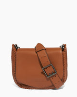 A chestnut All For Love Saddle Leather Crossbody Bag from Aimee Kestenberg on a white background.