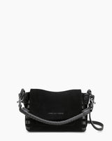 A black suede Zen Mini Crossbody bag from Aimee Kestenberg on a white background. 