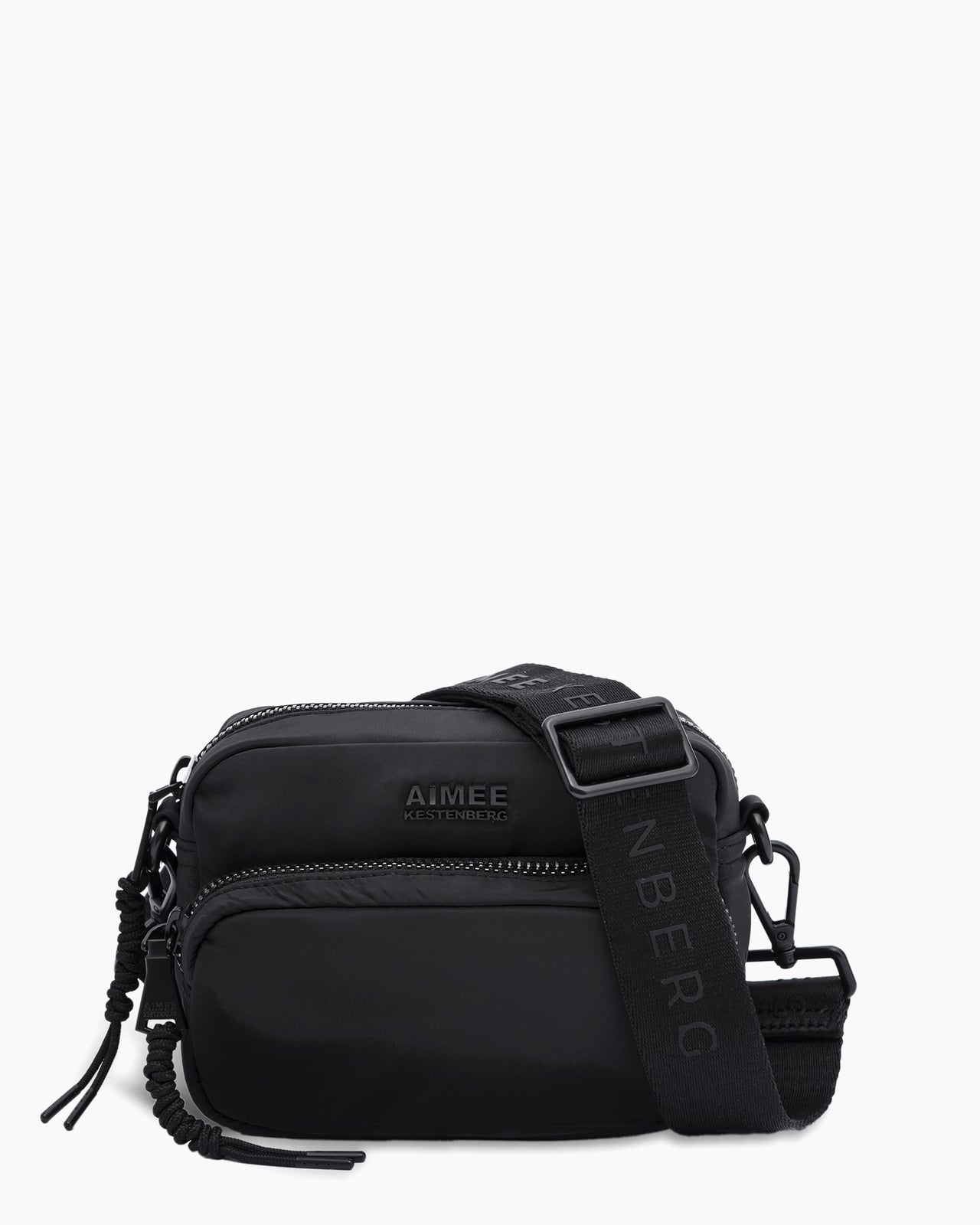 A black Nylon Camera Crossbody bag from Aimee Kestenberg on a white background.